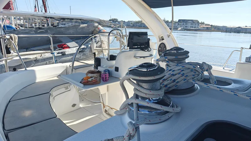 Slide: The Image of Cockpit of 1998 Hunter 410 sailboat with winches and navigation equipment. - 17