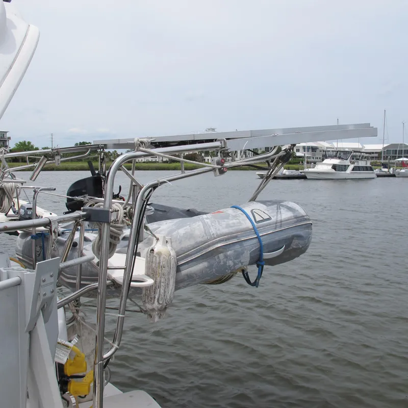 Slide: The Image of Sailboat with dinghy on davits, Hunter 410, 1998 model, docked in marina. - 19