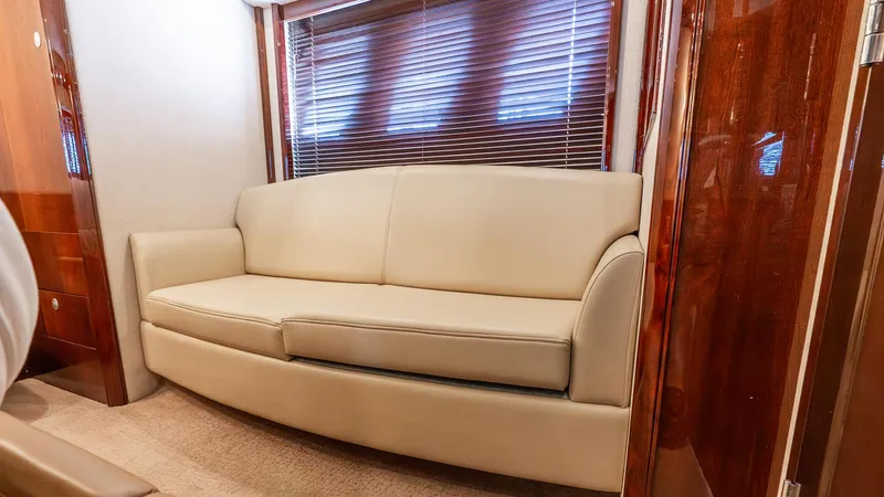 Slide: The Image of Luxurious interior of 2008 Sea Ray Sundancer yacht with beige leather sofa. - 23