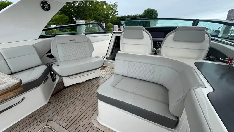 Slide: The Image of 2020 Sea Ray SLX 400 interior with luxurious seating and modern design. - 11