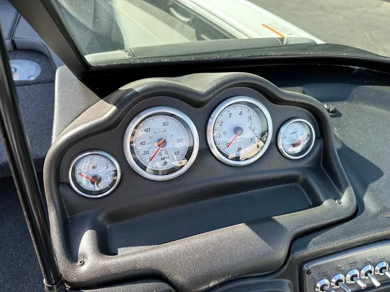 Slide: The Image of Dashboard of 2025 Lund 1875 Crossover XS boat with gauges and controls. - 23