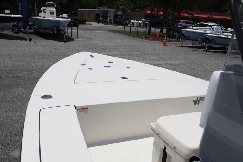 Slide: The Image of 2025 Hewes Redfisher 18 logo on boat exterior. - 9