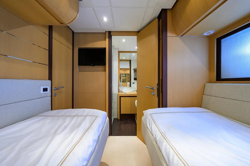 Slide: The Image of Interior of 2009 Pershing 90 Express yacht with twin beds and modern design. - 30