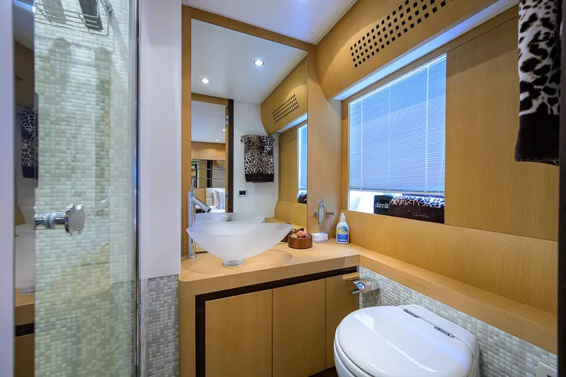 Slide: The Image of Luxurious bathroom interior of 2009 Pershing 90 Express yacht with modern fixtures. - 31