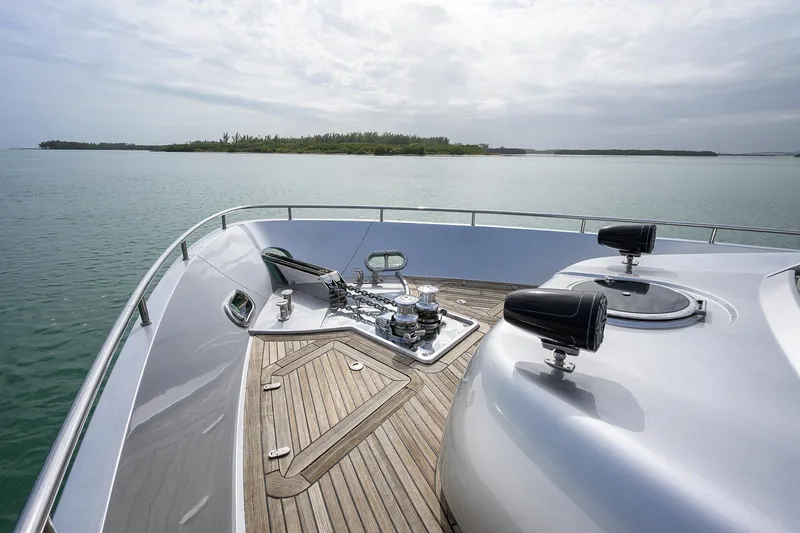 Slide: The Image of 2009 Pershing 90 Express yacht deck with ocean view and distant island. - 49