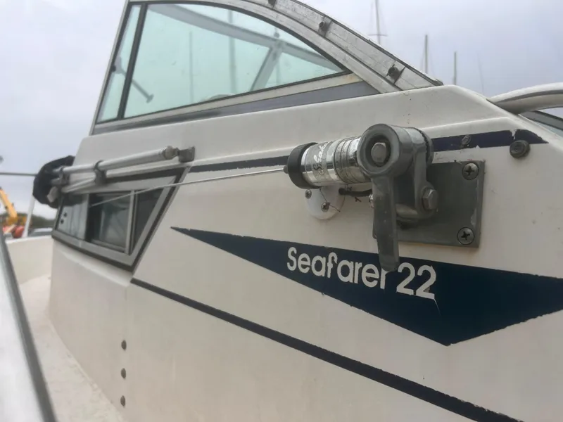 Slide: The Image of 1992 Grady-White 22 Seafarer boat side view with window and latch detail. - 2