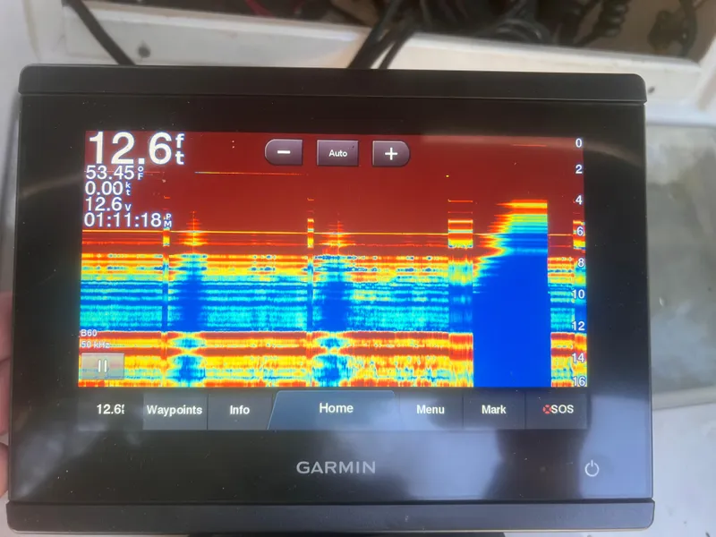 Slide: The Image of Garmin fishfinder display on 1992 Grady-White 22 Seafarer, showing sonar data and depth. - 20