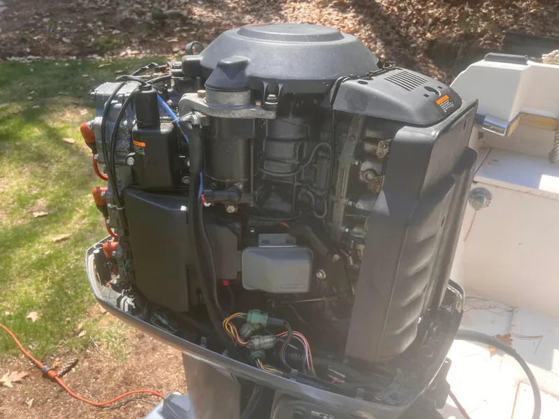 Slide: The Image of 1992 Grady-White 22 Seafarer boat engine, detailed view, outdoors. - 33