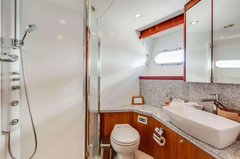 Slide: The Image of Luxurious bathroom in 2009 Sunseeker Manhattan 70 yacht with modern fixtures and elegant design. - 18