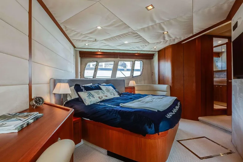 Slide: The Image of Luxurious bedroom interior of 2009 Sunseeker Manhattan 70 yacht with elegant wood finishes. - 19