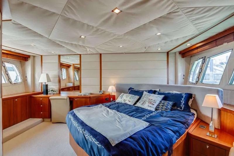 Slide: The Image of Luxurious bedroom interior of 2009 Sunseeker Manhattan 70 yacht with elegant furnishings. - 20