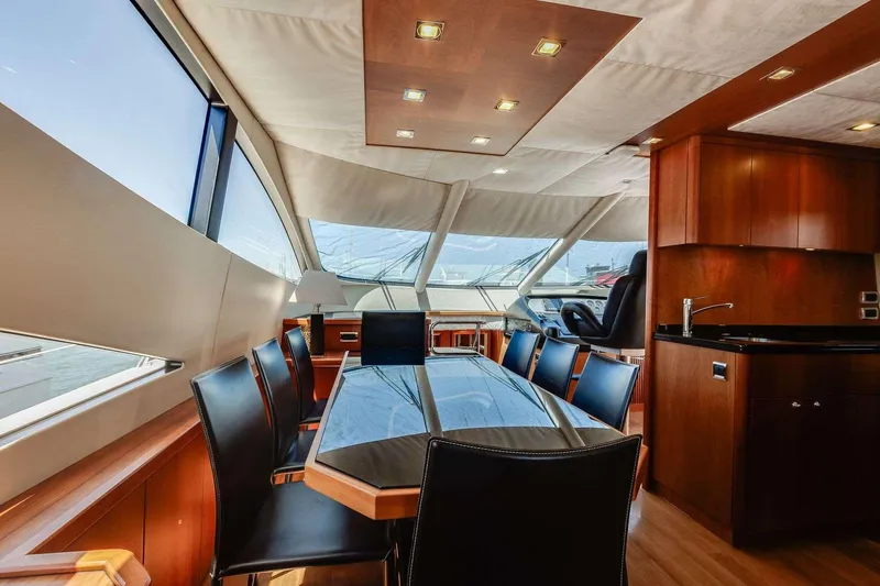 Slide: The Image of Luxurious interior of 2009 Sunseeker Manhattan 70 yacht with elegant dining area. - 29