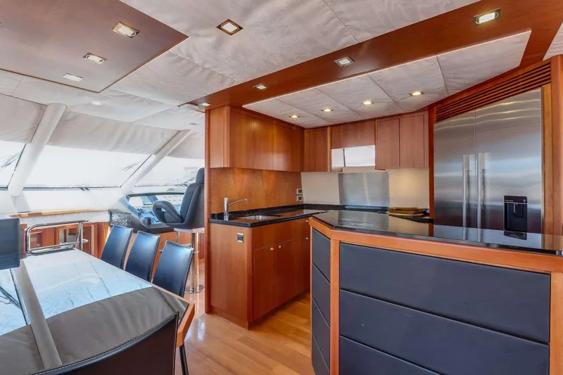 Slide: The Image of Luxurious interior of 2009 Sunseeker Manhattan 70 yacht with modern kitchen and dining area. - 30