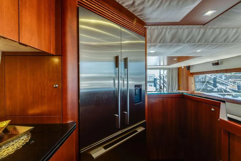 Slide: The Image of Luxurious kitchen interior of 2009 Sunseeker Manhattan 70 yacht with stainless steel appliances. - 34