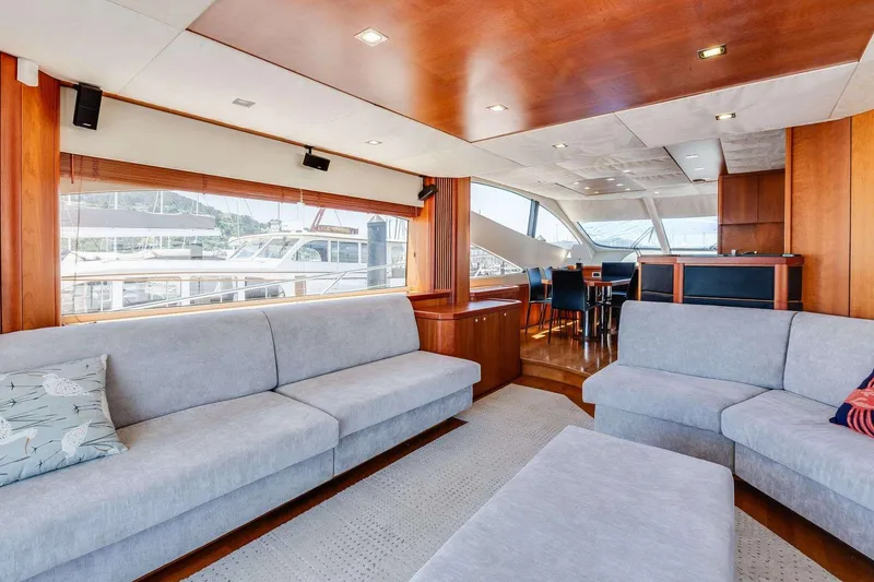 Slide: The Image of Luxurious interior of 2009 Sunseeker Manhattan 70 yacht with modern seating and large windows. - 36