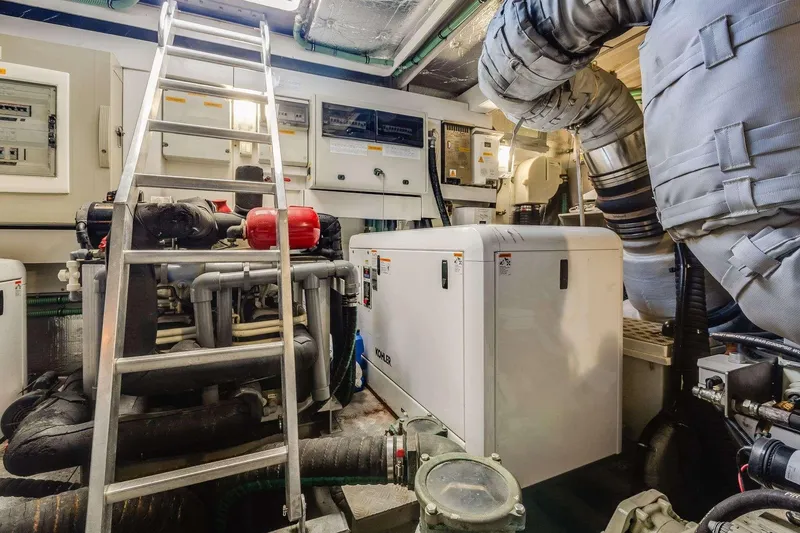 Slide: The Image of Engine room of 2009 Sunseeker Manhattan 70 yacht with machinery and ladder. - 42