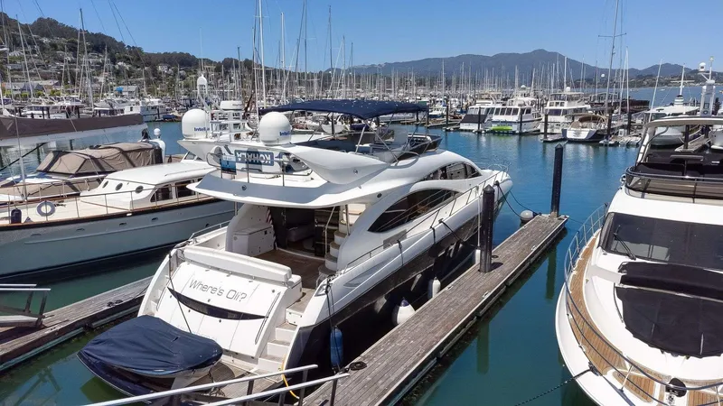 Slide: The Image of Luxury Sunseeker Manhattan 70 yacht docked in a marina, 2009 model. - 46