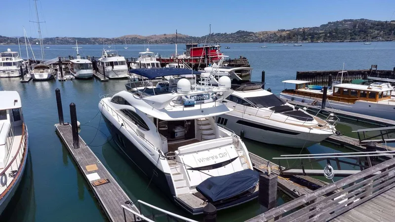 Slide: The Image of Luxury Sunseeker Manhattan 70 yacht docked at marina, 2009 model. - 48