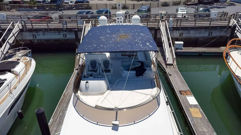 Slide: The Image of 2009 Sunseeker Manhattan 70 yacht docked in a marina, aerial view. - 49