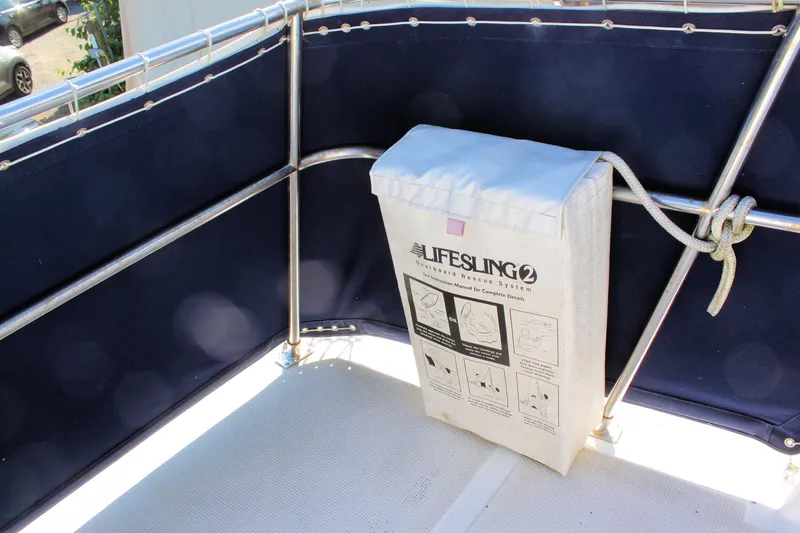 Slide: The Image of Lifesling2 safety device on 2000 Island Gypsy 32 boat deck. - 23