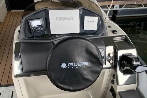 Slide: The Image of 2019 Coach Pontoons 230 RF Tritoon dashboard with Gussi Italia steering wheel. - 13