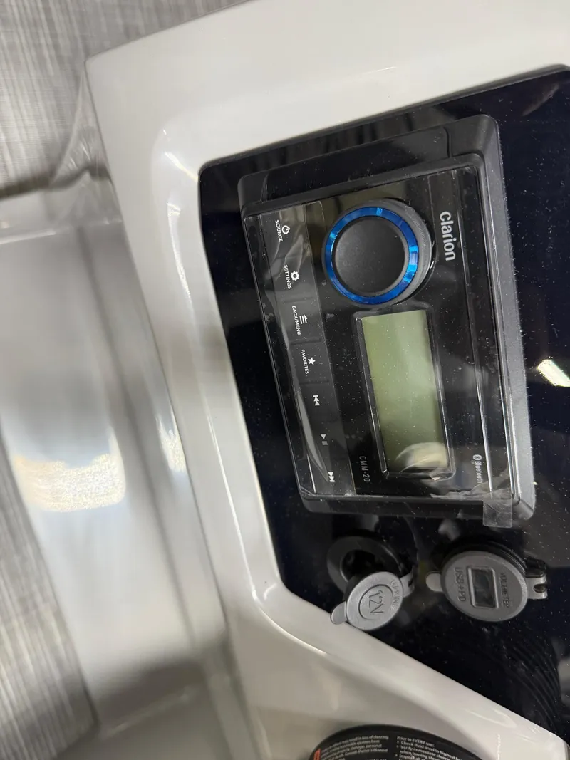 Slide: The Image of Viaggio V20U 2025 dashboard with Clarion audio system and control panel. - 14