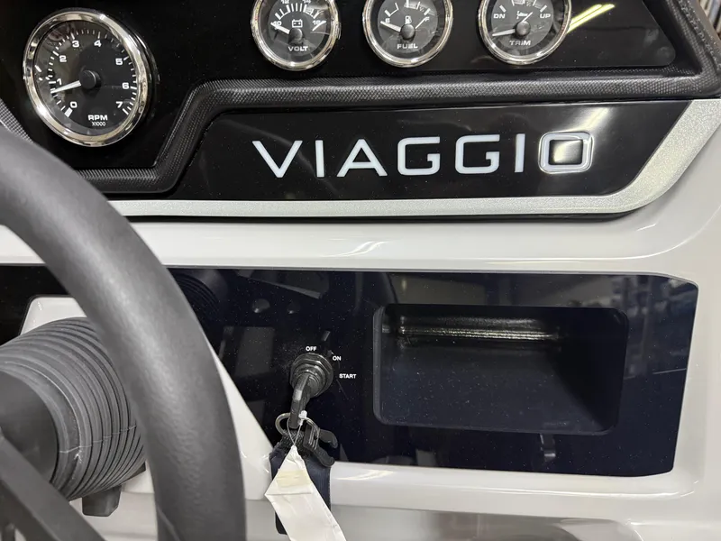 Slide: The Image of Dashboard of 2025 Viaggio V20U with gauges and ignition key. - 15