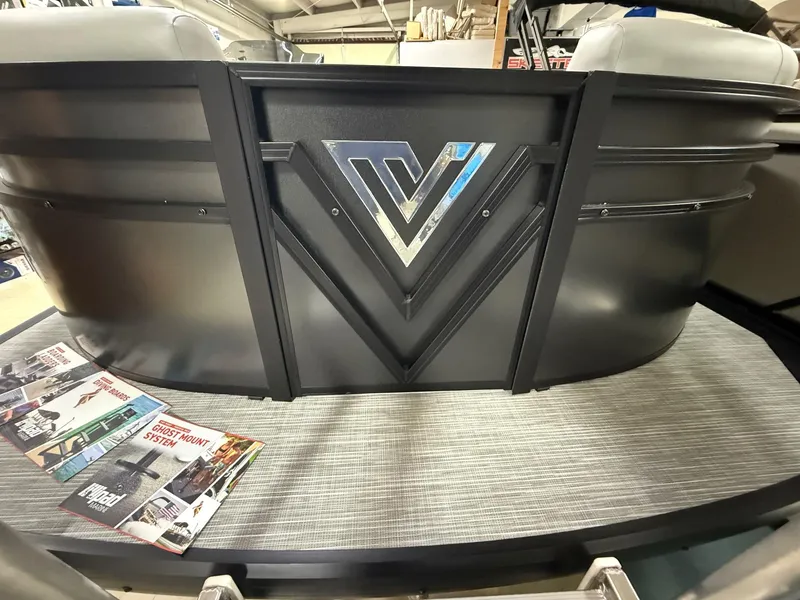 Slide: The Image of 2025 Viaggio V20U boat with sleek design and logo, displayed indoors. - 4