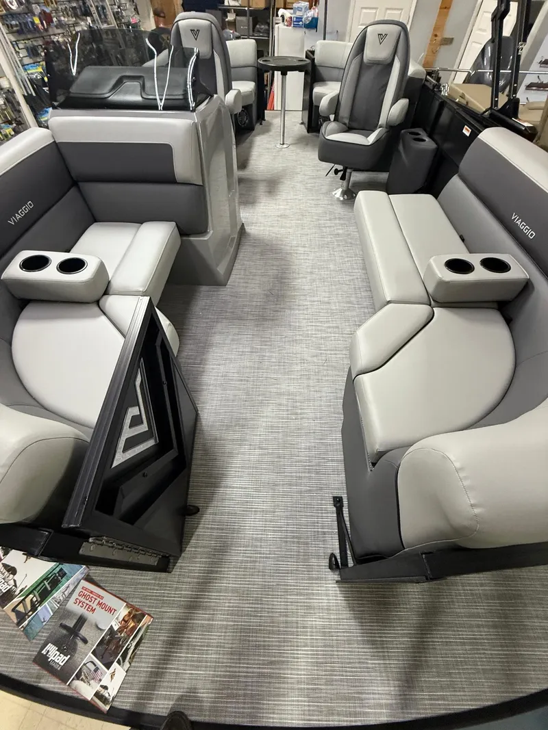 Slide: The Image of Luxurious 2025 Viaggio V20U boat interior with plush seating and cup holders. - 5