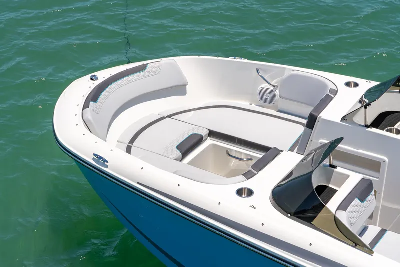 Slide: The Image of 2024 Bayliner M17 boat with sleek design on clear water. - 15
