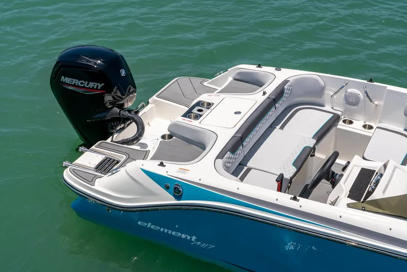 Slide: The Image of 2024 Bayliner M17 boat with Mercury engine on turquoise water. - 8