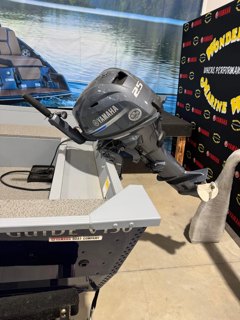 Slide: The Image of 2024 G3 V150T boat with Yamaha 25HP outboard motor displayed indoors. - 3