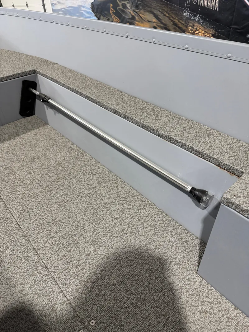 Slide: The Image of 2024 G3 V150T Guide boat interior with textured flooring and metal handrail. - 5