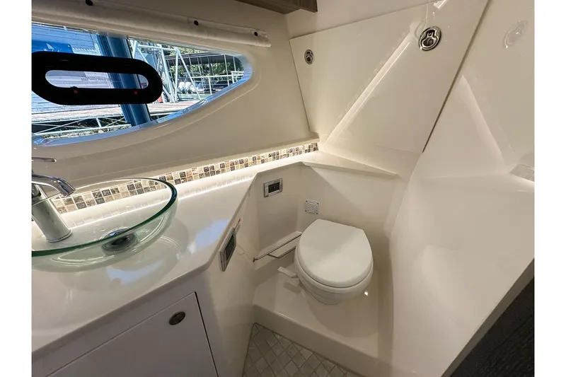 Slide: The Image of Luxurious bathroom in 2025 Sea Ray Sundancer 370 yacht with modern fixtures. - 22