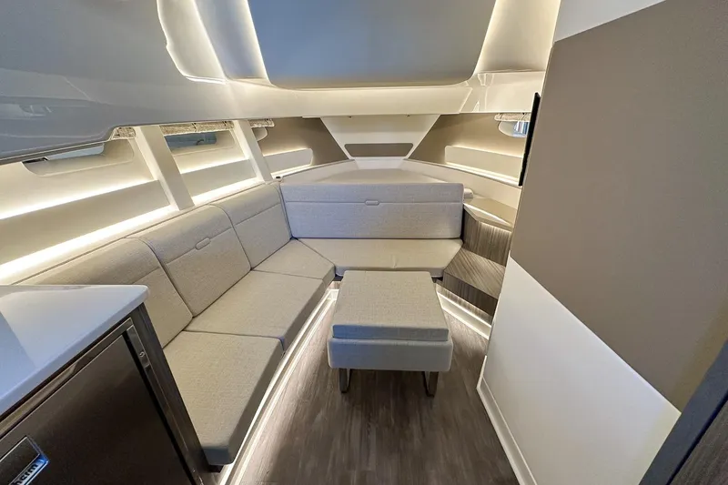 Slide: The Image of Luxurious interior of 2025 Sea Ray Sundancer 370 yacht with modern seating and ambient lighting. - 32