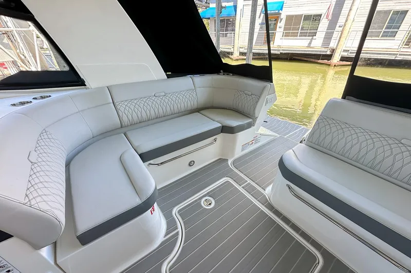 Slide: The Image of 2025 Sea Ray Sundancer 370 interior with elegant seating and modern design. - 8