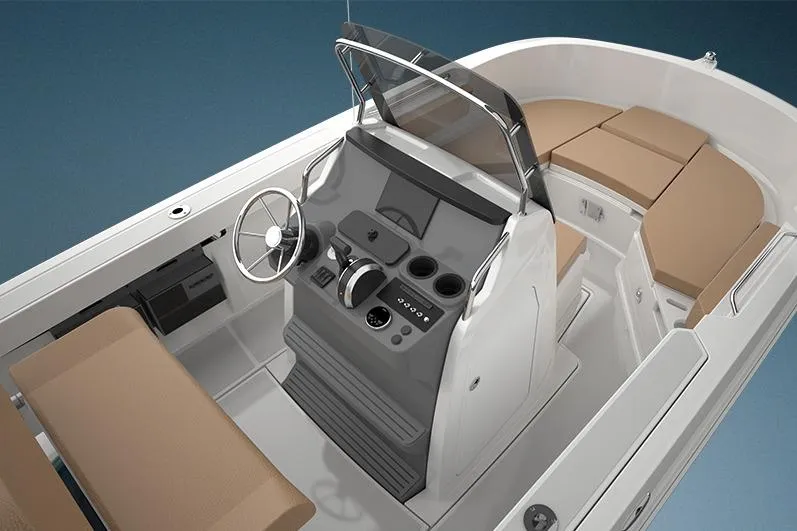 Slide: The Image of 2023 Bayliner Trophy 20CC boat interior with helm, seating, and modern design. - 35