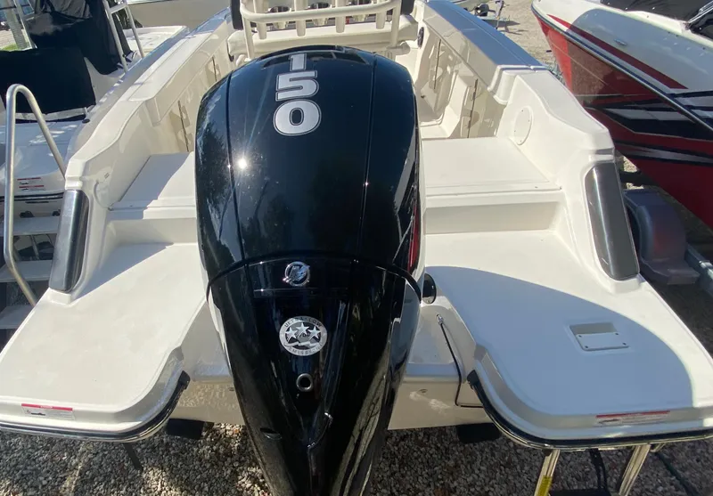 The Image of 2023 Bayliner Trophy 20CC boat with a 150 horsepower engine, rear view. - 8