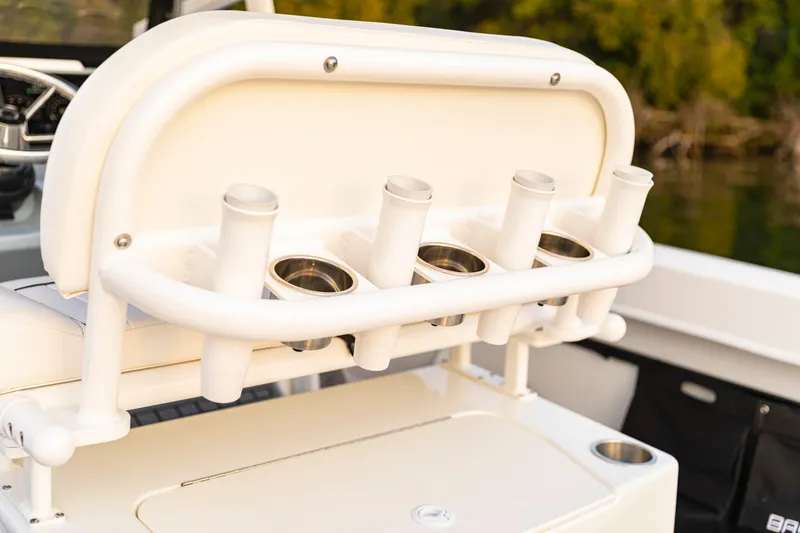 Slide: The Image of 2024 Bayliner Trophy 22CC boat rod holders and seating detail. - 16