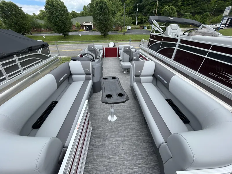 Slide: The Image of 2024 Bennington 22 SVSR-SPS pontoon boat with spacious seating and modern design. - 3