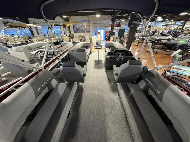 Slide: The Image of Interior of a 2025 Bennington 20 pontoon boat, showcasing spacious seating and modern design. - 3