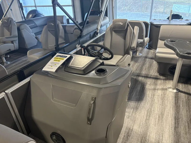 Slide: The Image of 2025 Bennington 21 SF boat interior with steering console and seating. - 3