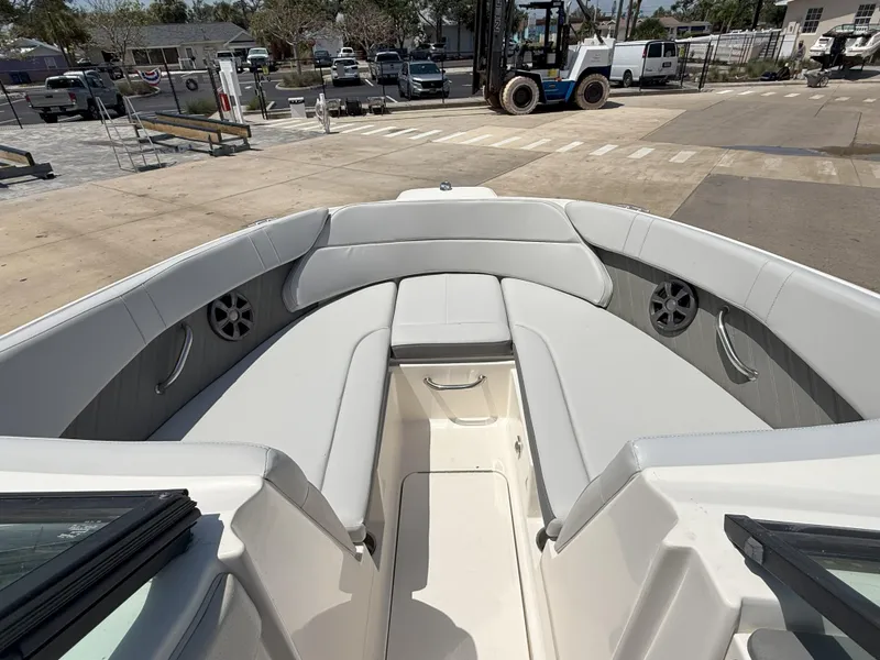 Slide: The Image of 2020 Sea Ray SPX 230 OB boat interior with spacious seating and modern design. - 26