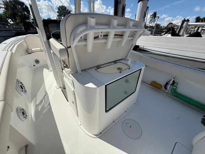 Slide: The Image of 2023 Sea Hunt Gamefish 25 boat interior with seating and storage. - 17