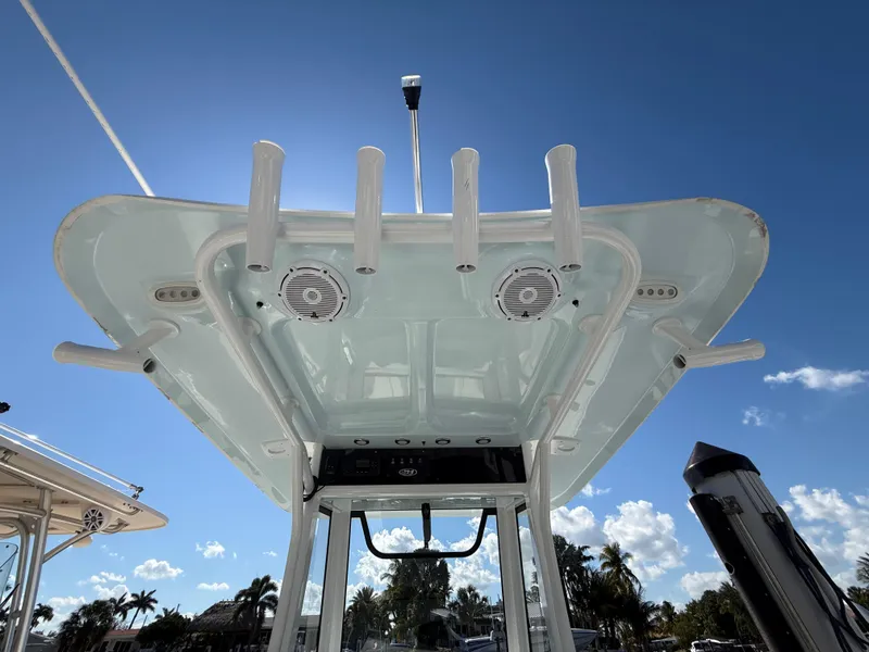 Slide: The Image of 2023 Sea Hunt Gamefish 25 boat top view with rod holders and speakers. - 18