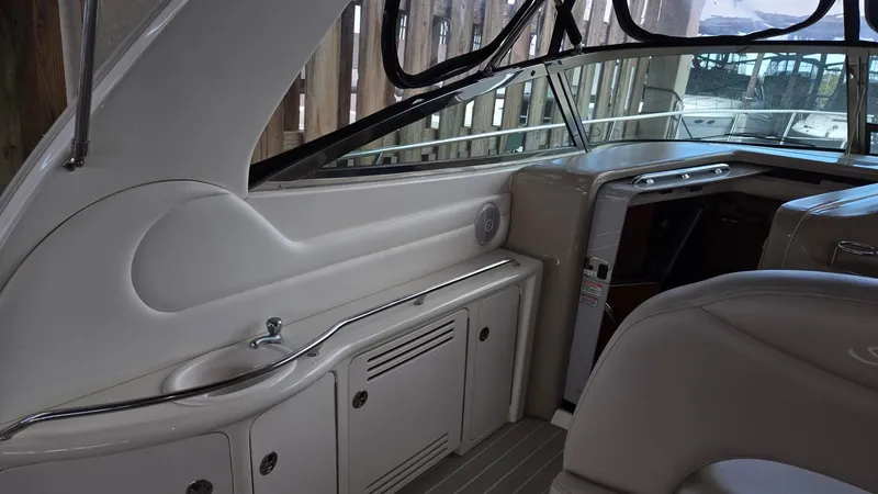 Slide: The Image of 2004 Sea Ray 380 Sundancer interior with sleek design and modern amenities. - 16
