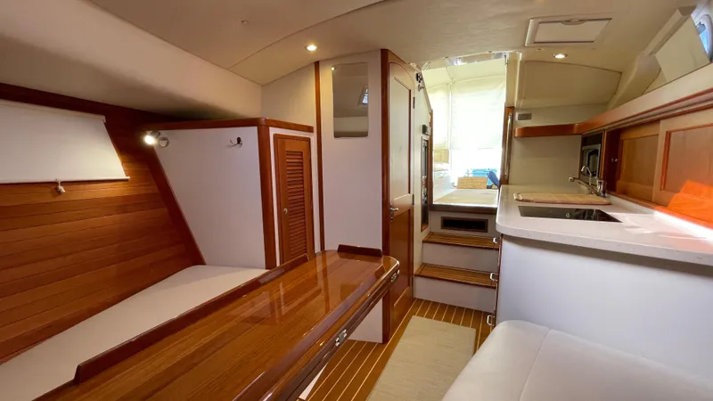 Slide: The Image of Interior of 2020 MJM 35z yacht with wood accents and modern amenities. - 20
