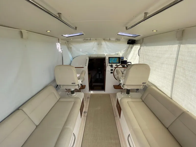 Slide: The Image of Interior of 2020 MJM 35z boat with seating and helm station. - 22