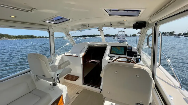 Slide: The Image of Interior view of a 2020 MJM 35z boat with modern navigation equipment. - 7