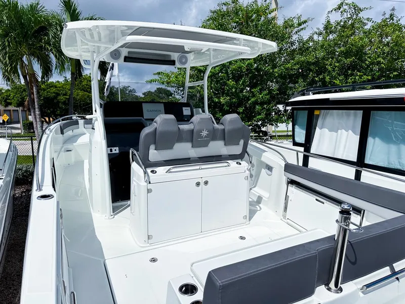Slide: The Image of 2024 Jeanneau LEADER 9.0CC boat with sleek design and modern seating. - 7